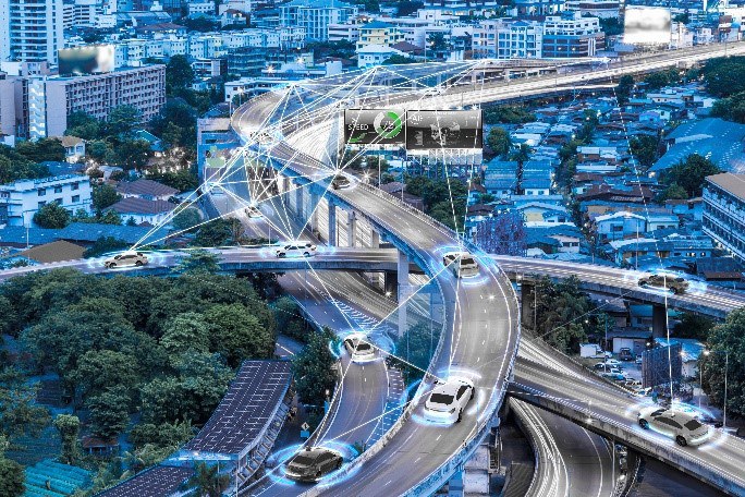 Ansicht einer Großstadt mit der Darstellung von smarten Autos die über WLAN verbunden sind